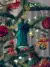 Glass ornament Desiderius Erasmus hanging in Christmas tree with decorations