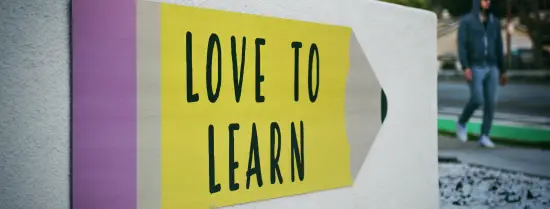 signs that says: love to learn